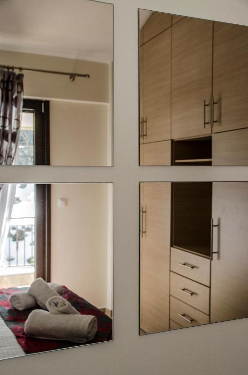 Postel nebo postele na pokoji v ubytování Pasithei