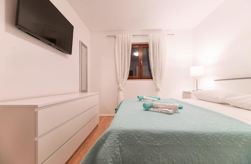 Posteľ alebo postele v izbe v ubytovaní Apartment Andrina