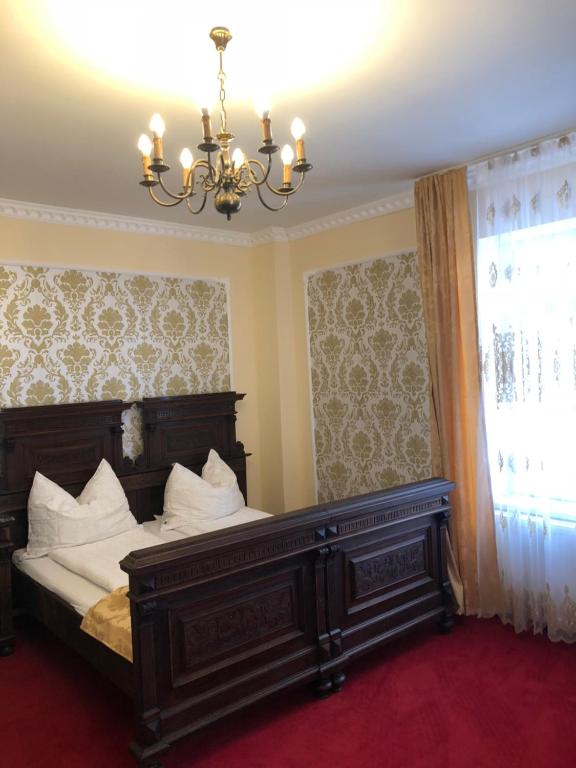 Ein Bett oder Betten in einem Zimmer der Unterkunft Lambach Villa