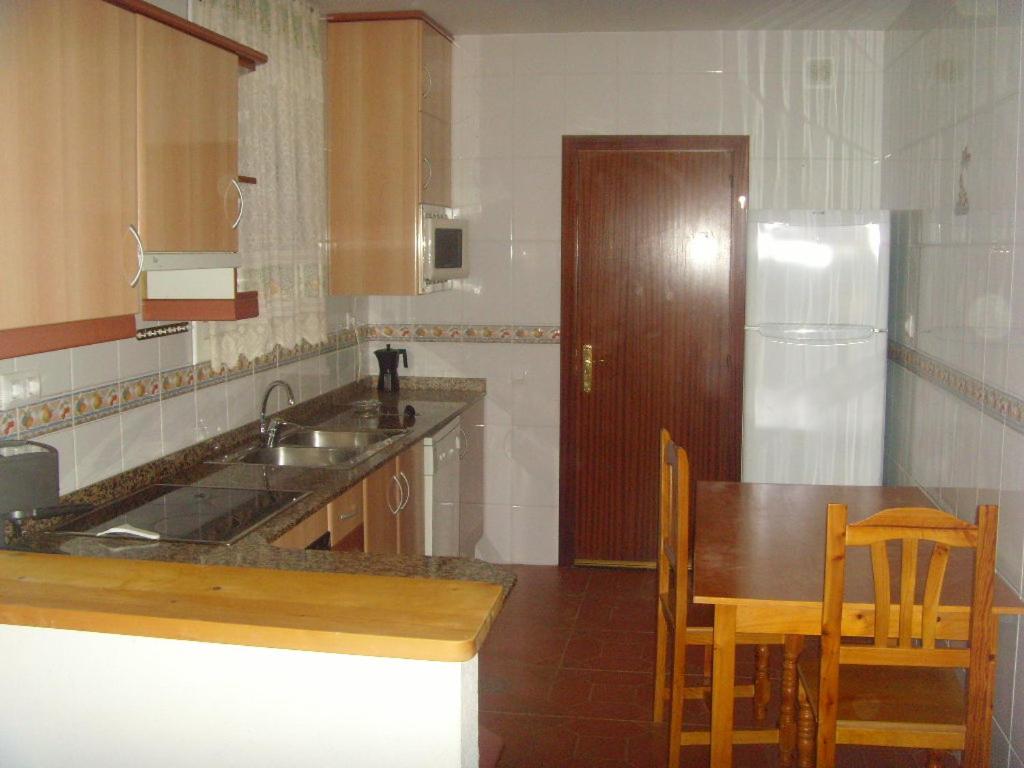 Kuchyňa alebo kuchynka v ubytovaní RIVIERA