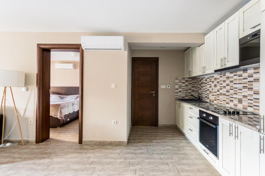Kuchyň nebo kuchyňský kout v ubytování Keystone Apartments