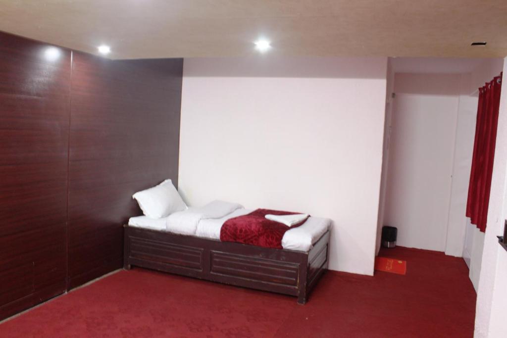 Postel nebo postele na pokoji v ubytování Hotel Paradiso