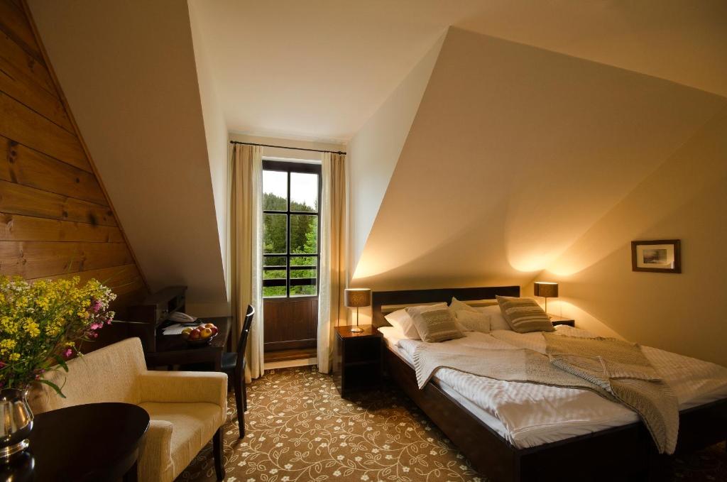 Postel nebo postele na pokoji v ubytování Hotel Annín