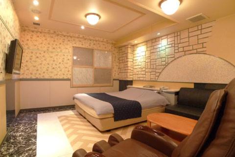 Postel nebo postele na pokoji v ubytování Hotel GOLF II Atsugi (Adult Only)