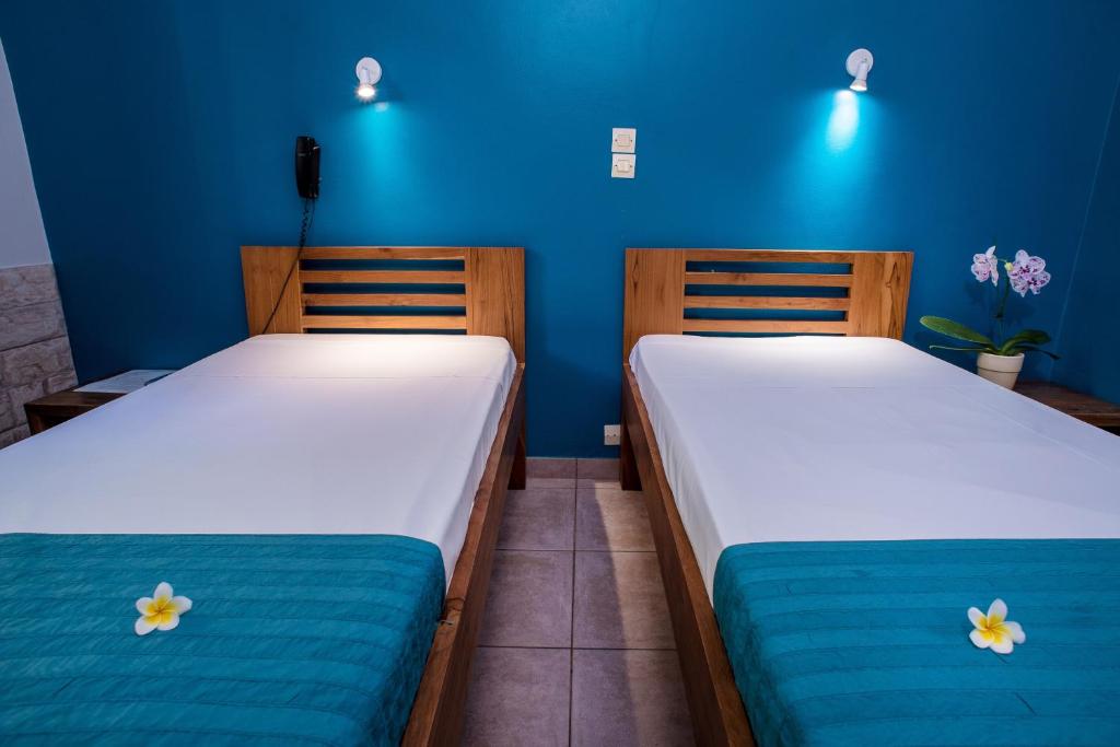 Postel nebo postele na pokoji v ubytování Hotel Cap Sud