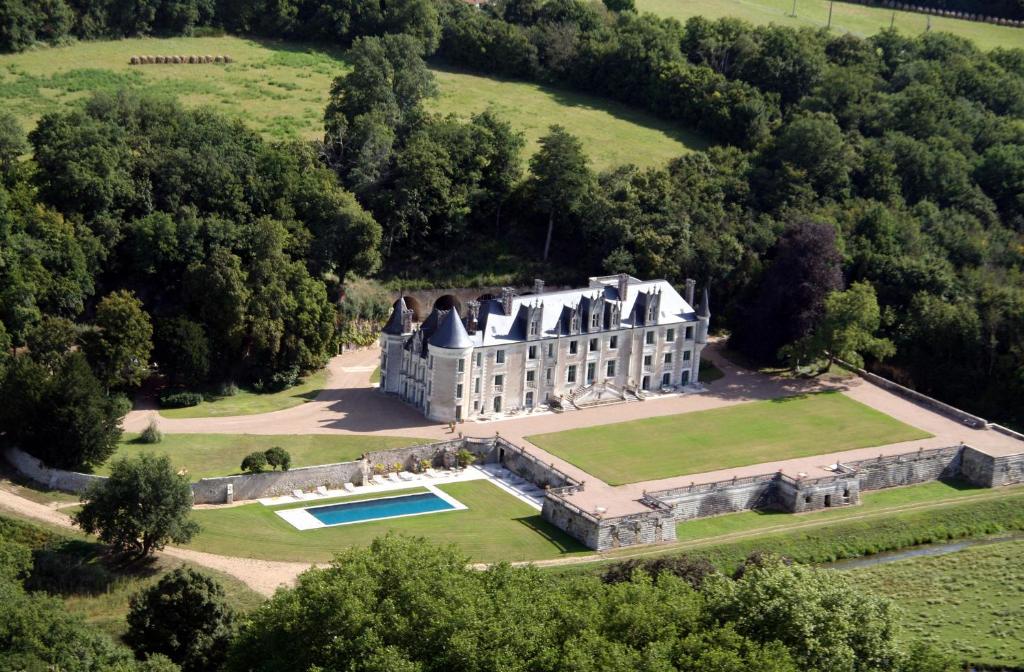 an aerial view of an estate with a swimming pool at Chateau des Arpentis in Amboise
