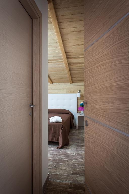 Postel nebo postele na pokoji v ubytování Piccolo Hotel Aurora