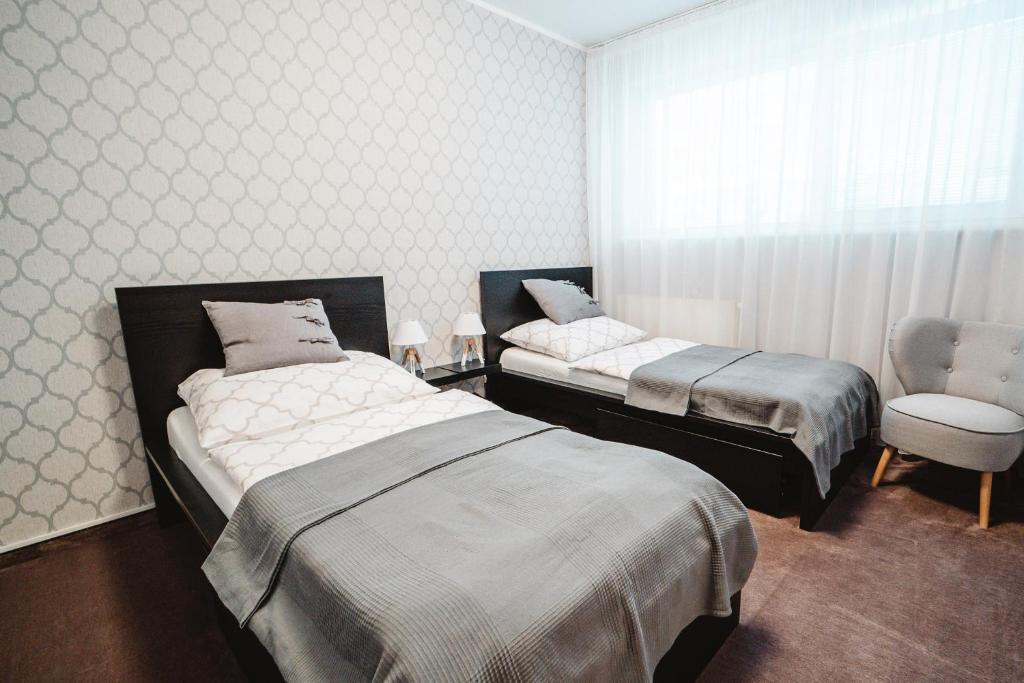 Postel nebo postele na pokoji v ubytování Penzion Set