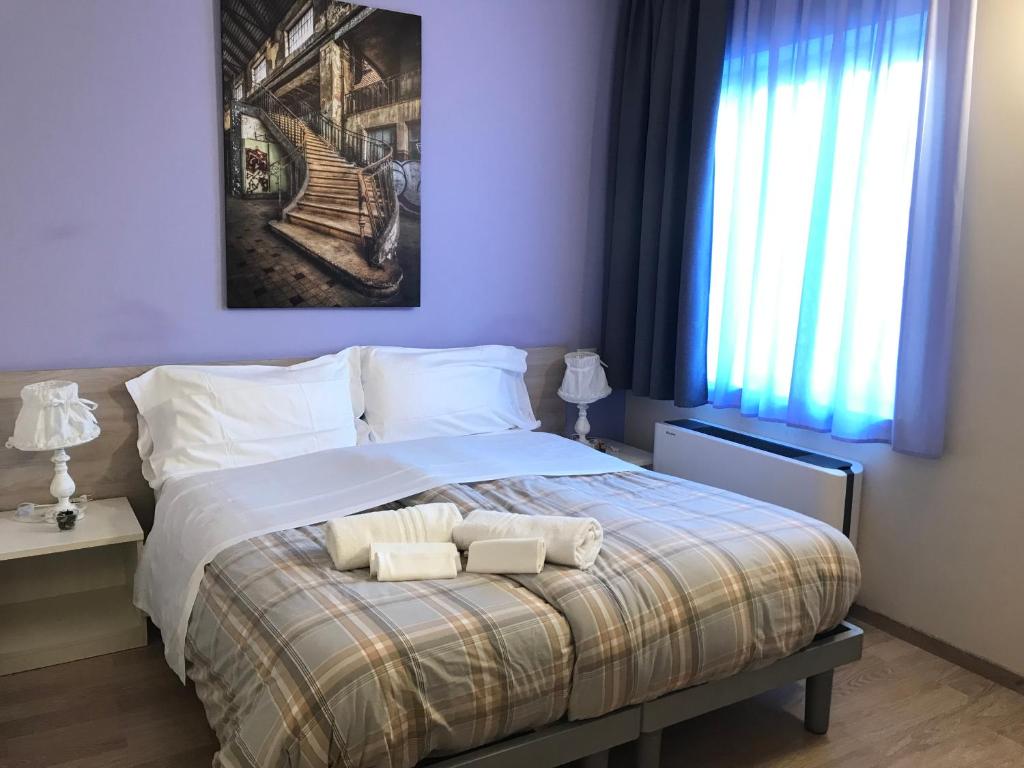 Postel nebo postele na pokoji v ubytování Albergo Trattoria Italia