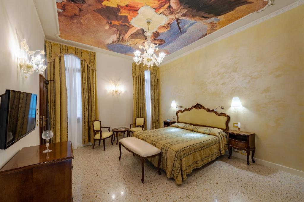 Postel nebo postele na pokoji v ubytování Hotel Scandinavia - Relais