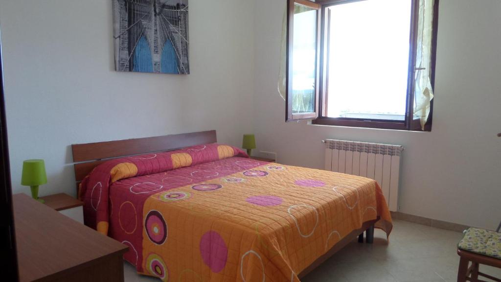 Letto o letti in una camera di B&B La Posada Stintino