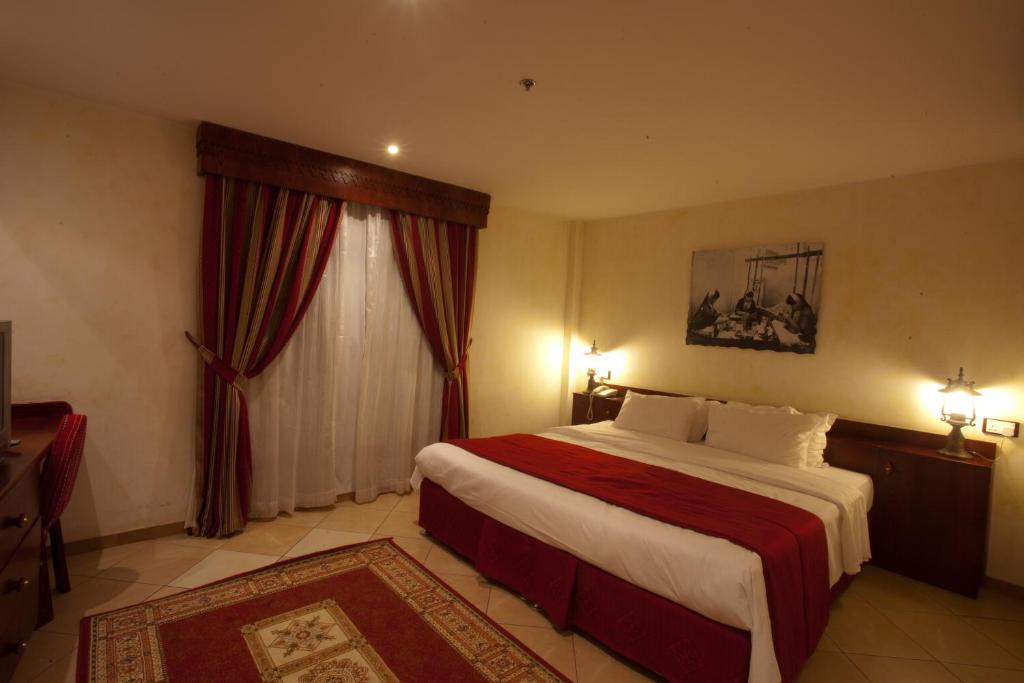 Krevet ili kreveti u jedinici u okviru objekta Al Liwan Suites