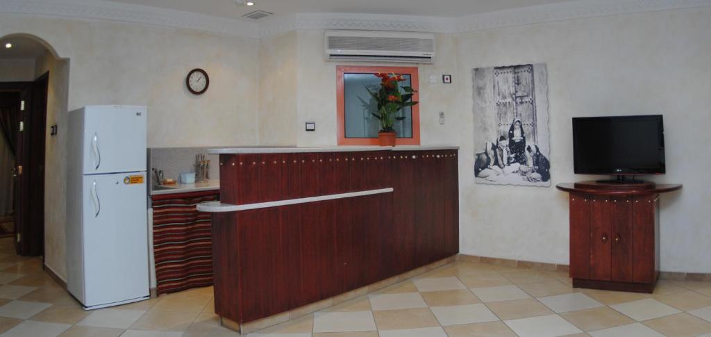 Kuhinja ili čajna kuhinja u objektu Al Liwan Suites