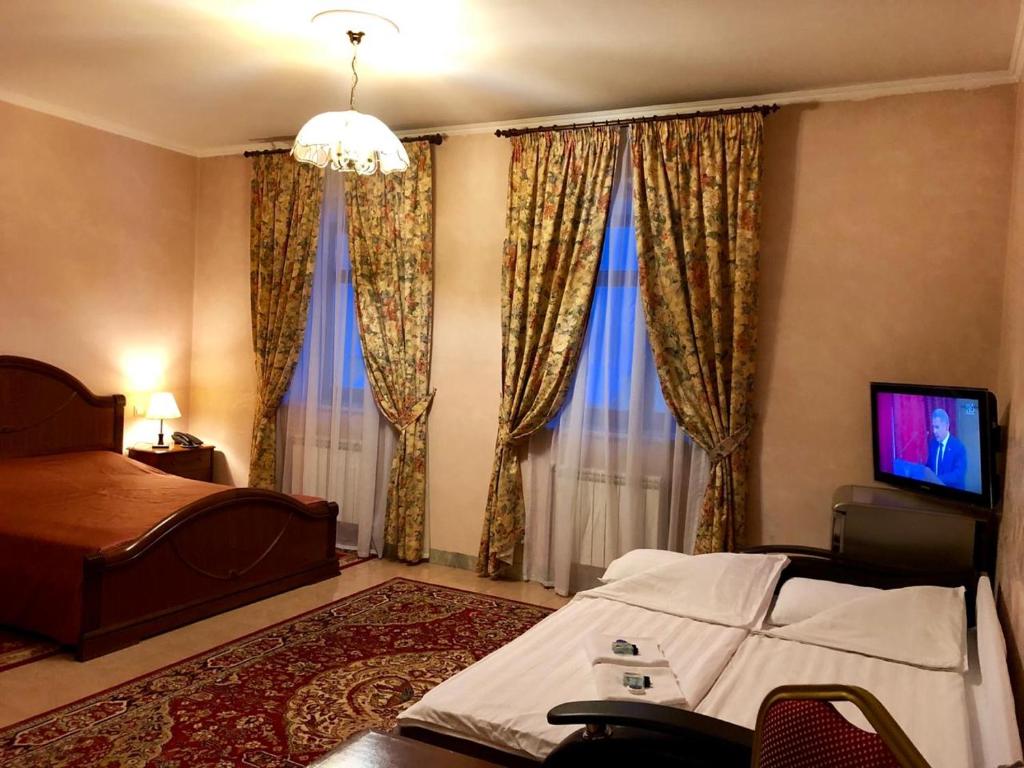 Postel nebo postele na pokoji v ubytování Giuseppe Hotel