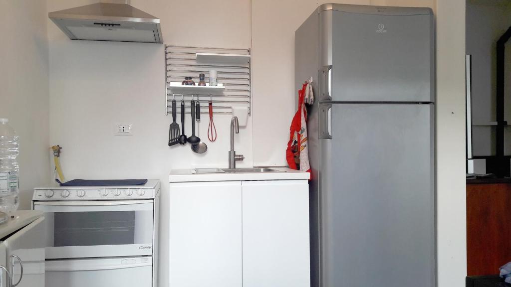 A kitchen or kitchenette at Casa Zelia