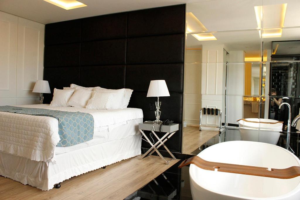Postel nebo postele na pokoji v ubytování Blue Open Hotel