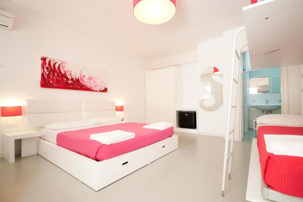 Postel nebo postele na pokoji v ubytování Hotel Beach Salento