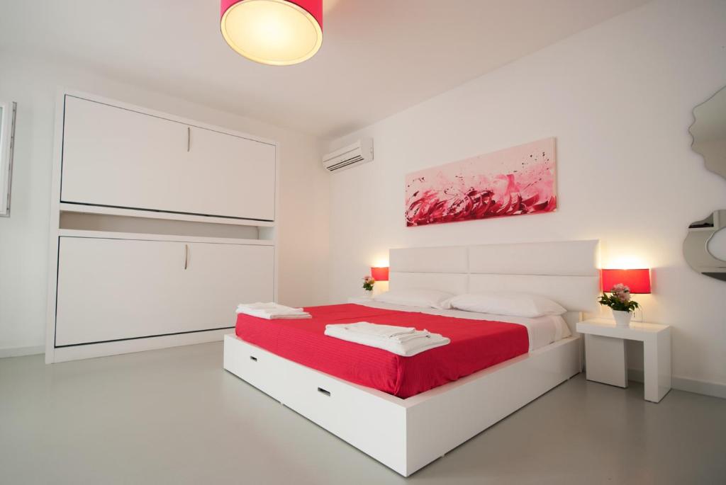 Postel nebo postele na pokoji v ubytování Hotel Beach Salento