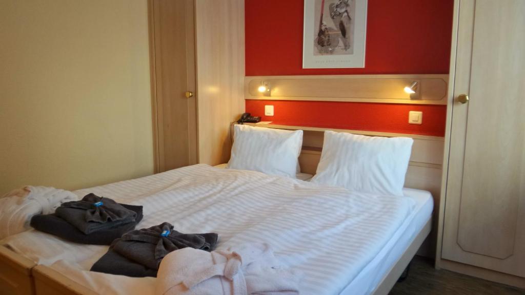 Postel nebo postele na pokoji v ubytování Hotel Europa