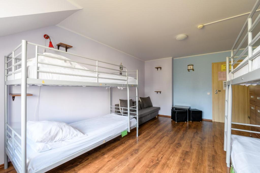 Postel nebo postele na pokoji v ubytování Hostel Krokodyl-Stara Praga