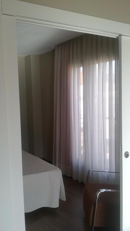 Postel nebo postele na pokoji v ubytování Posada La Casona de Valbuena