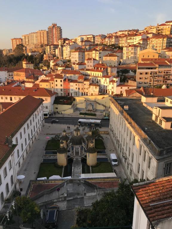 an aerial view of a city with buildings at NN Guest House in Coimbra