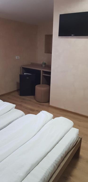 Postel nebo postele na pokoji v ubytování EFM Motel