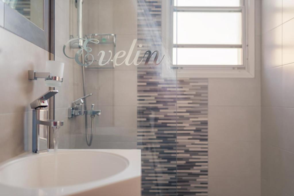 Koupelna v ubytování Evelin hotel