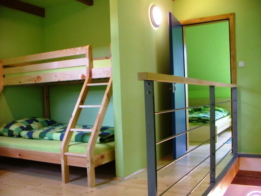 Postel nebo postele na pokoji v ubytování Apartmány Nové Hutě