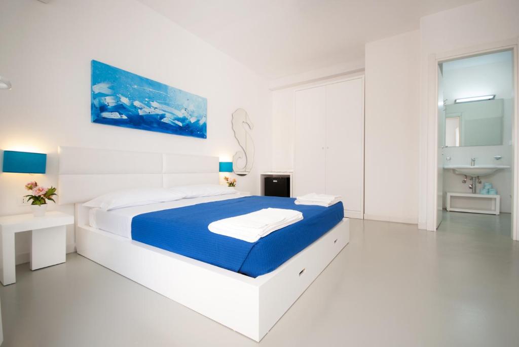 Postel nebo postele na pokoji v ubytování Hotel Beach Salento