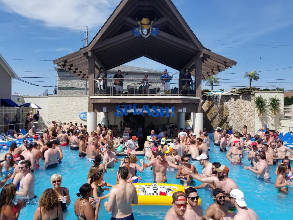 a large group of people in a swimming pool at Grand Islander Hotel in Put-in-Bay