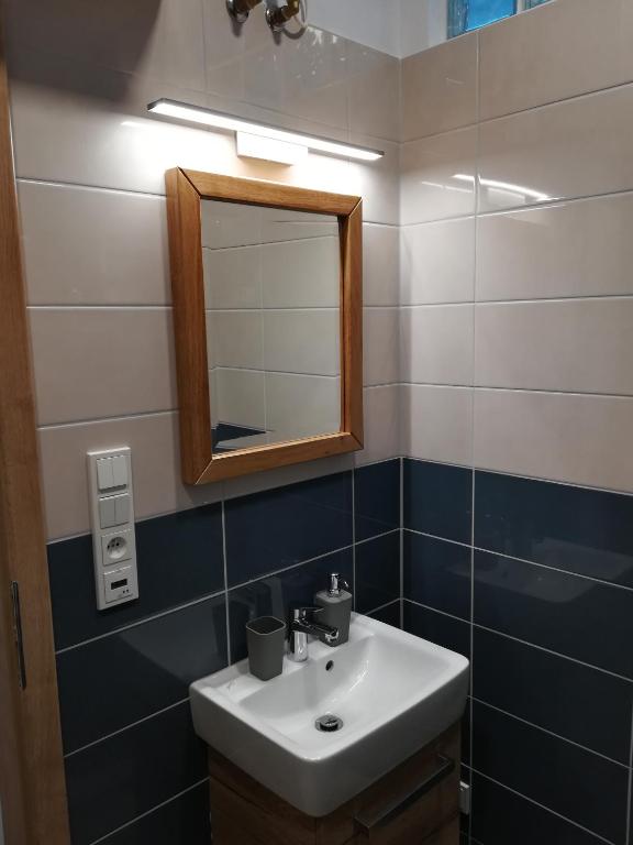 Koupelna v ubytování Apartmány U Holubů