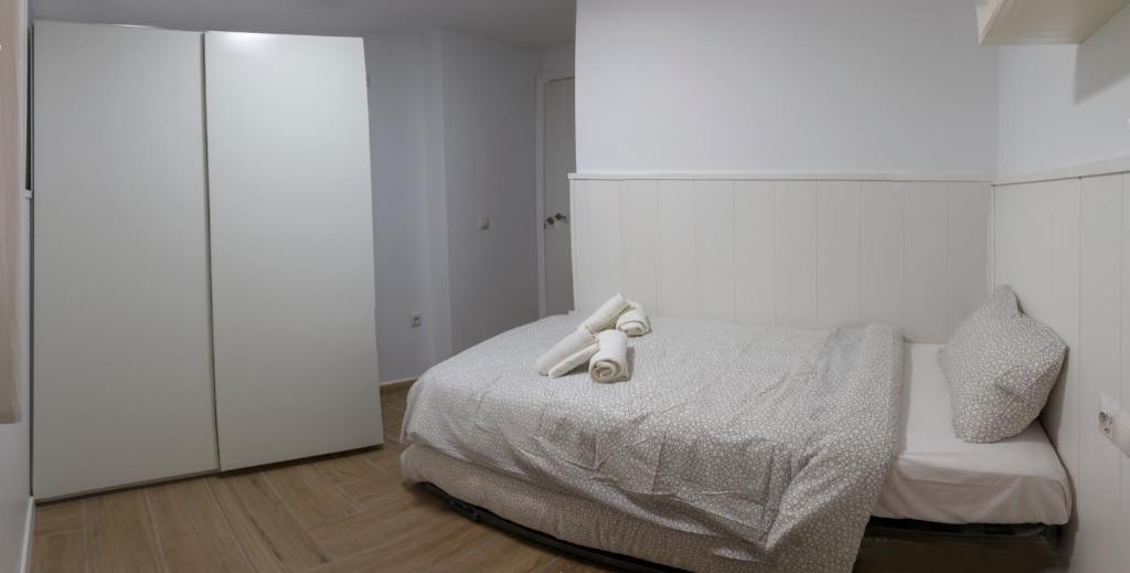 Postel nebo postele na pokoji v ubytování Alegranza