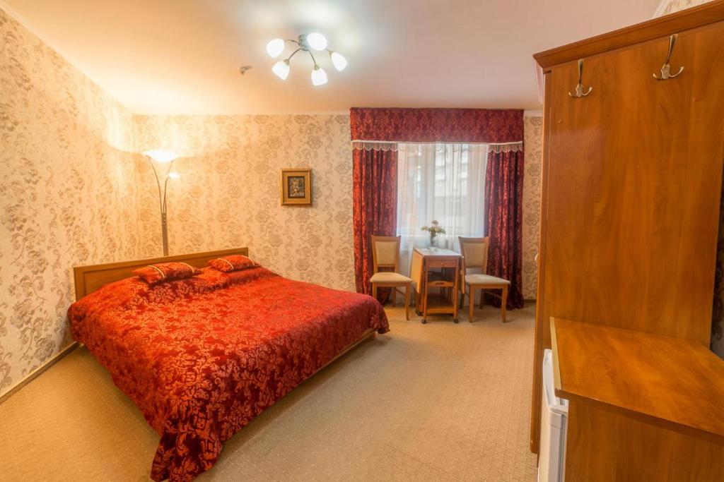 Postel nebo postele na pokoji v ubytování Hotel Premyer