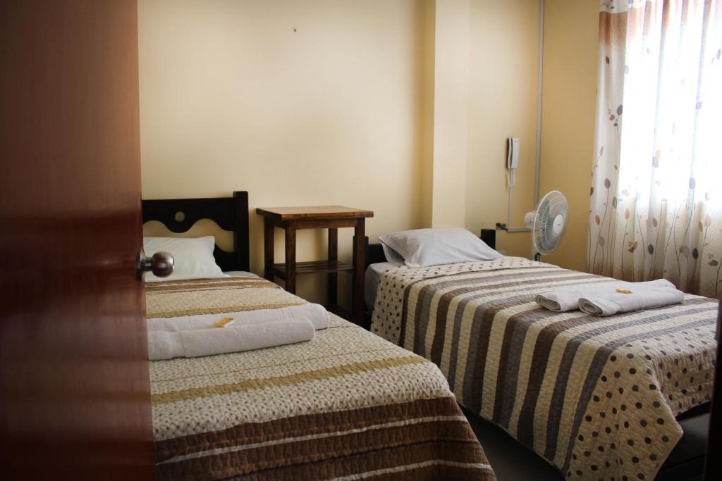 Postel nebo postele na pokoji v ubytování Rosenverg B&B Tours