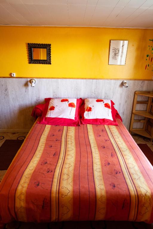 Postel nebo postele na pokoji v ubytování Relais du Volcan