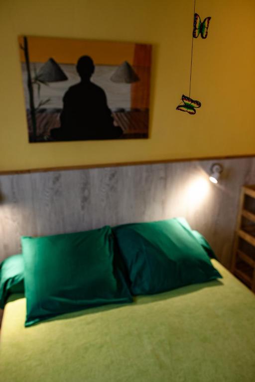 Postel nebo postele na pokoji v ubytování Relais du Volcan
