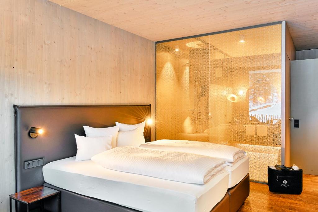 Postel nebo postele na pokoji v ubytování Aktiv-Hotel Sarotla