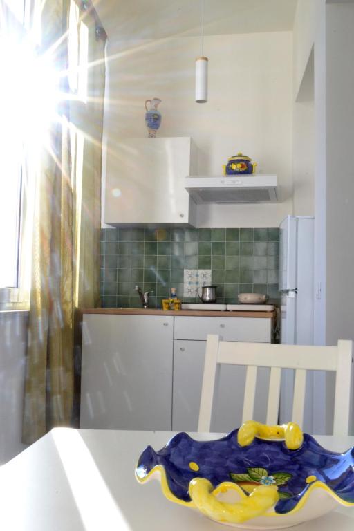 Kuchyň nebo kuchyňský kout v ubytování L'Agrumeto