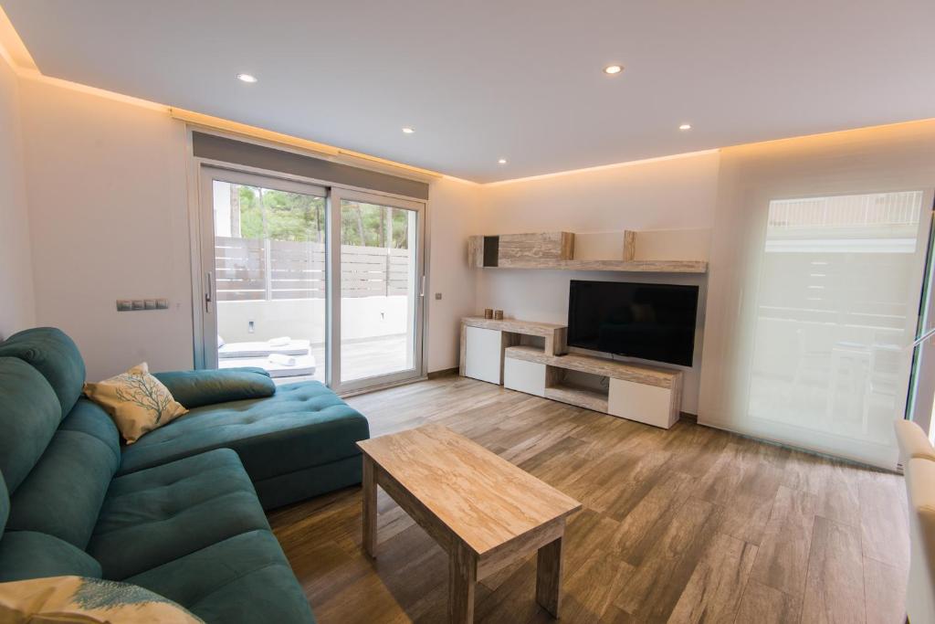 A television and/or entertainment centre at Villa Can Nieves