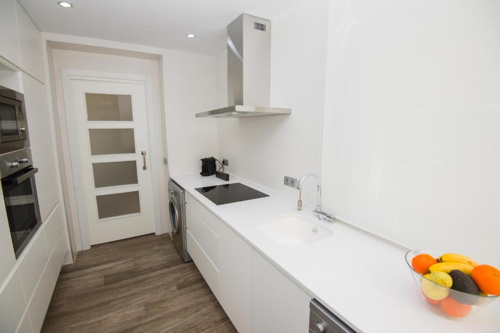 A kitchen or kitchenette at Villa Can Nieves