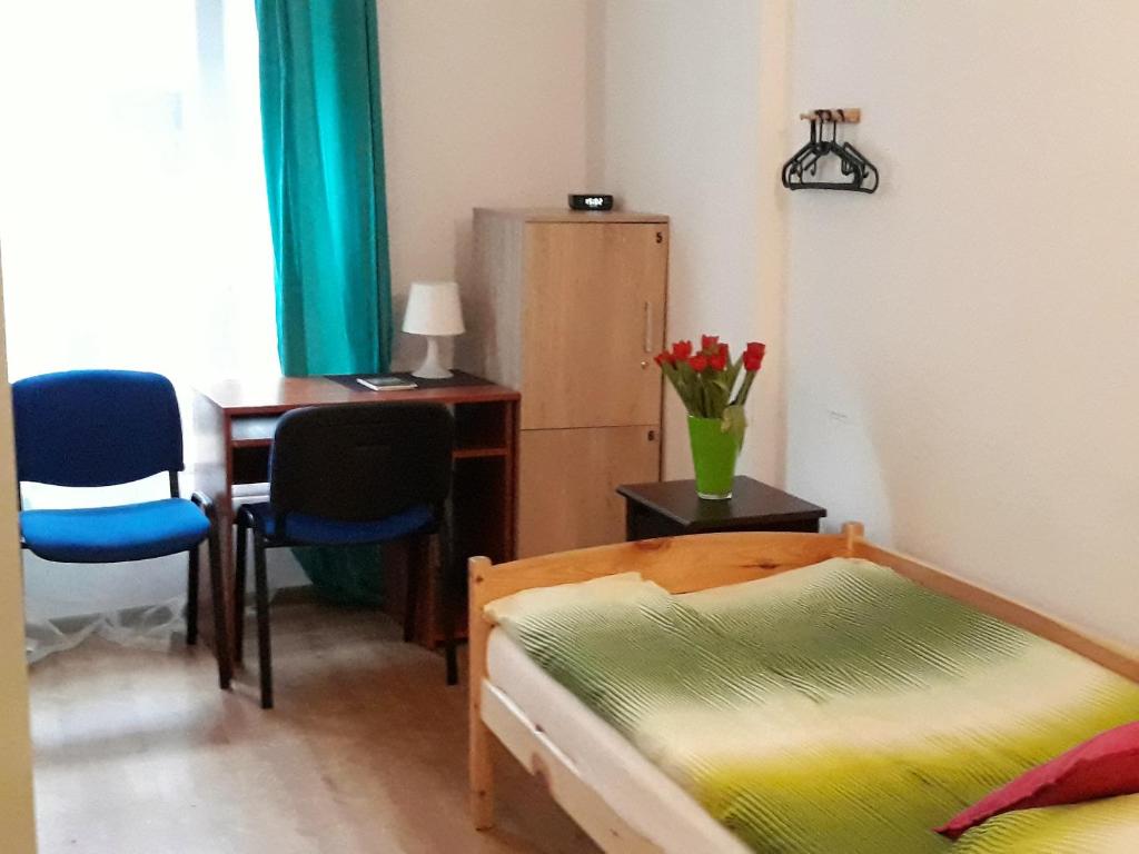 Postel nebo postele na pokoji v ubytování Hostel Gliwice Centrum PARKING