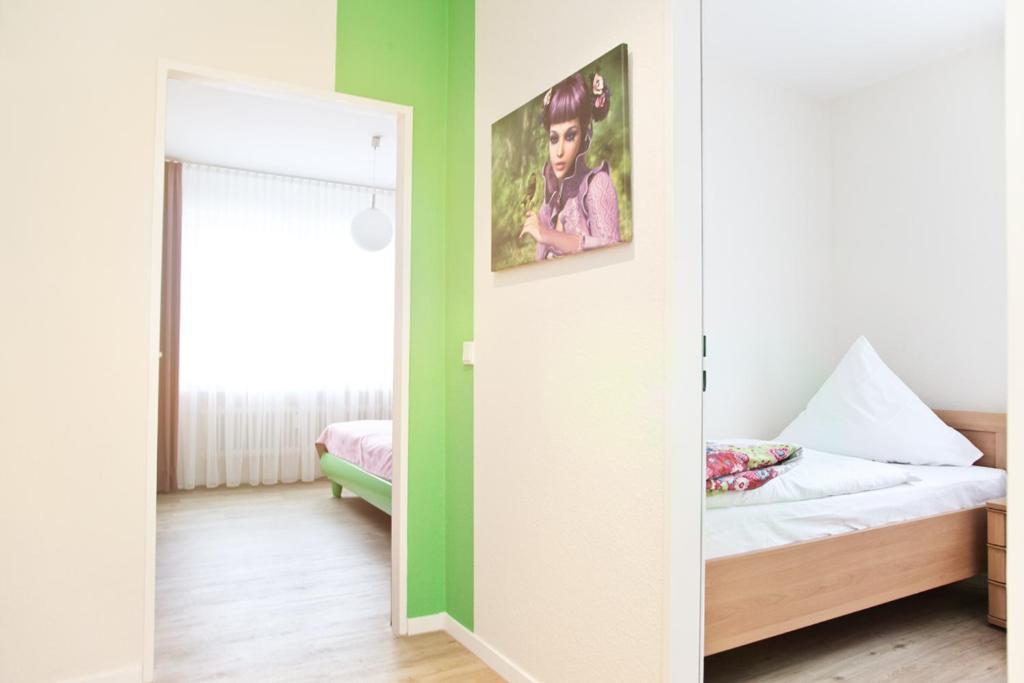 Postel nebo postele na pokoji v ubytování Hotel Wulff