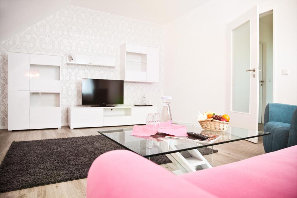 TV a/nebo společenská místnost v ubytování Hotel Wulff