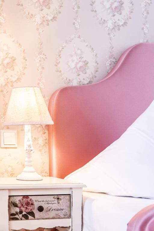 Postel nebo postele na pokoji v ubytování Hotel Wulff
