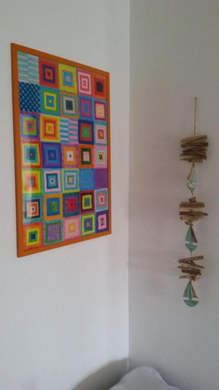 a wall with a painting on the wall at Casa in SALENTO a Otranto in Otranto