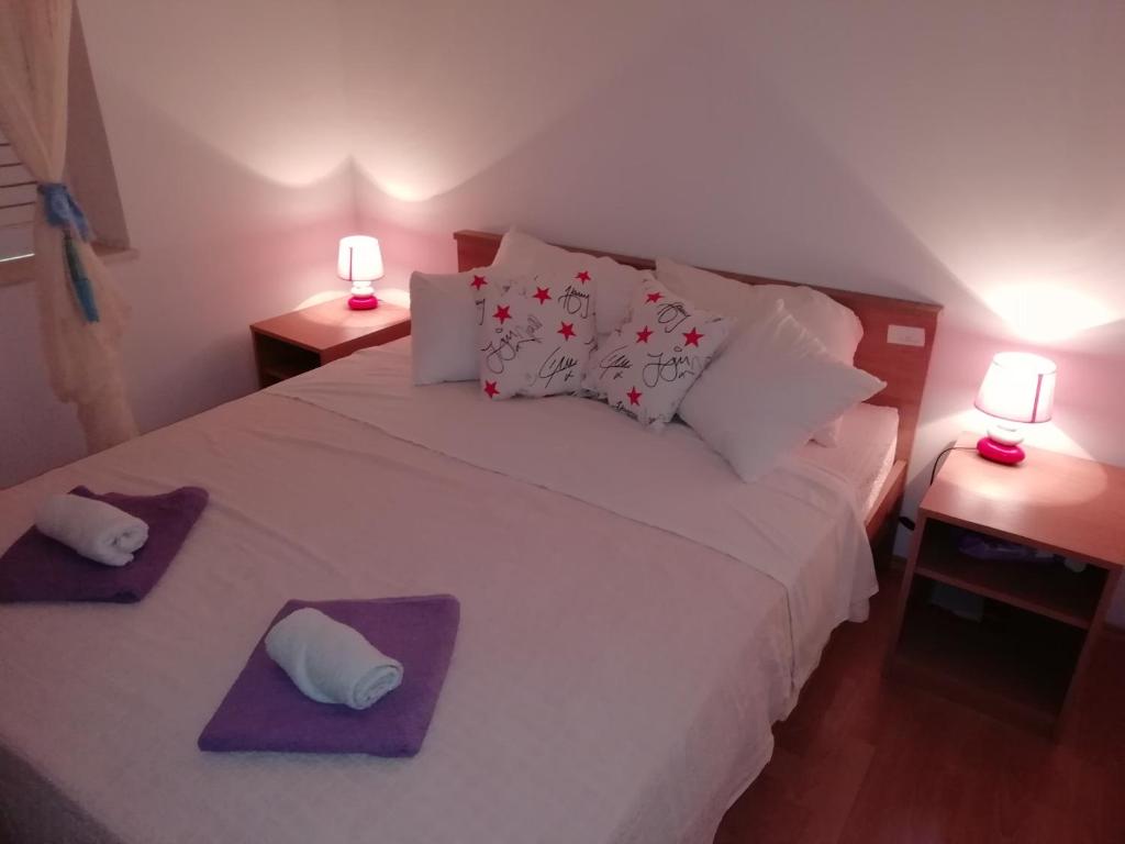 Posteľ alebo postele v izbe v ubytovaní Apartman Radic