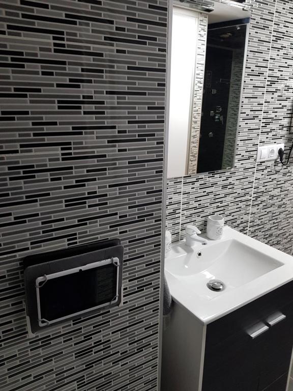 Koupelna v ubytování Apartamentos Sueños de Toledo