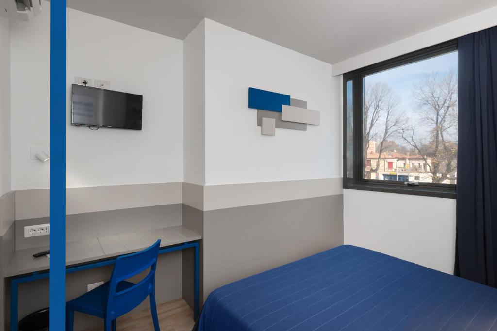 TV a/nebo společenská místnost v ubytování Hotel Martini