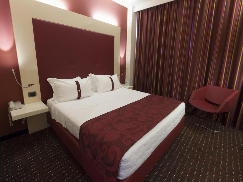 Posteľ alebo postele v izbe v ubytovaní Grand Hotel Mattei